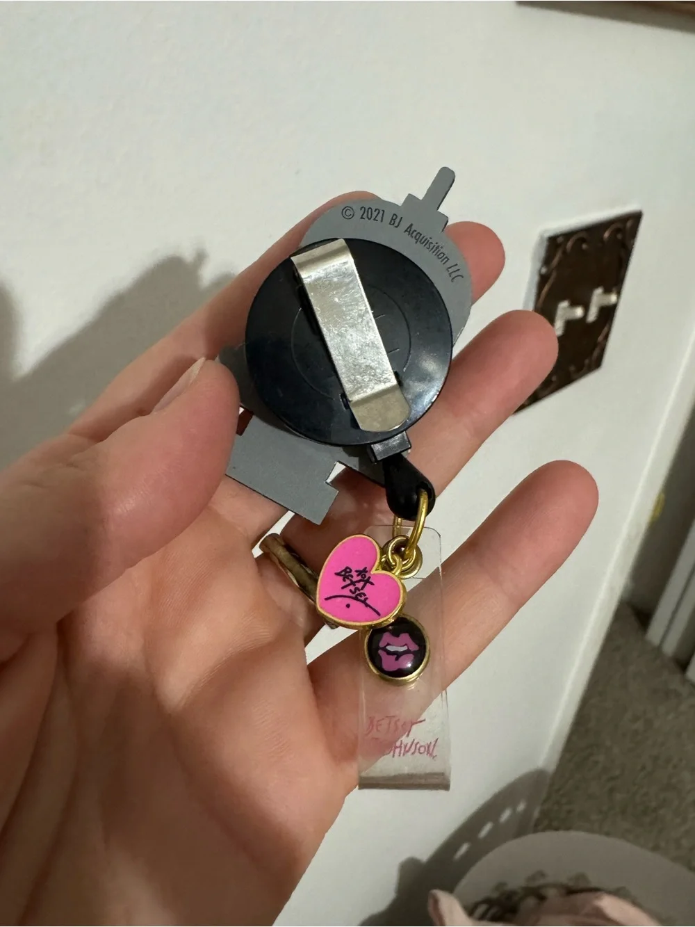 Betsey Johnson Black & Gold 'I Call the Shots' Shaker Keychain with Pink Charm
